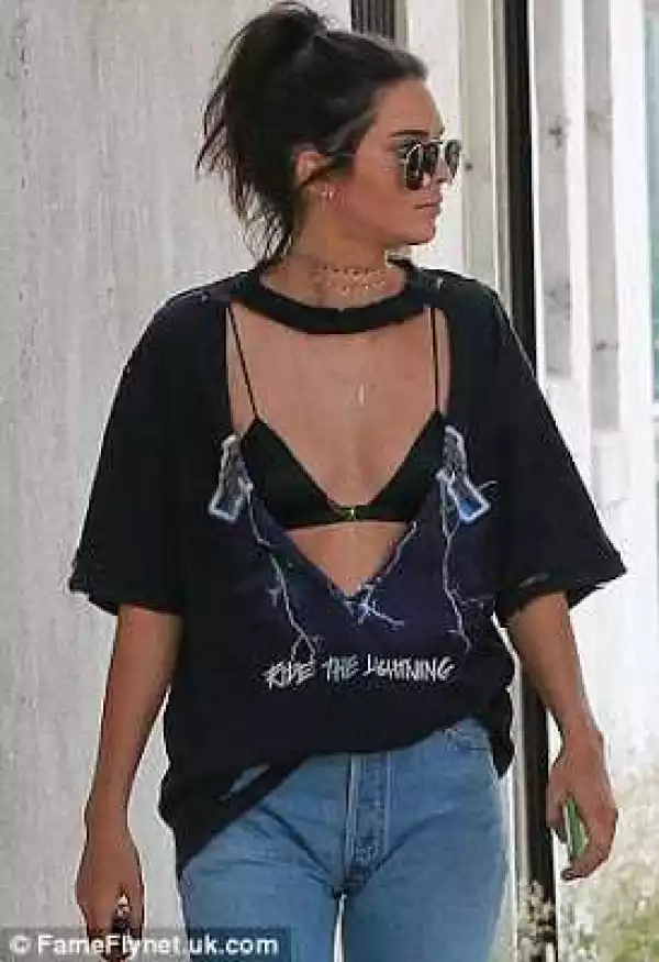 Photos: Kendall Jenner Steps Out In Distressed Top